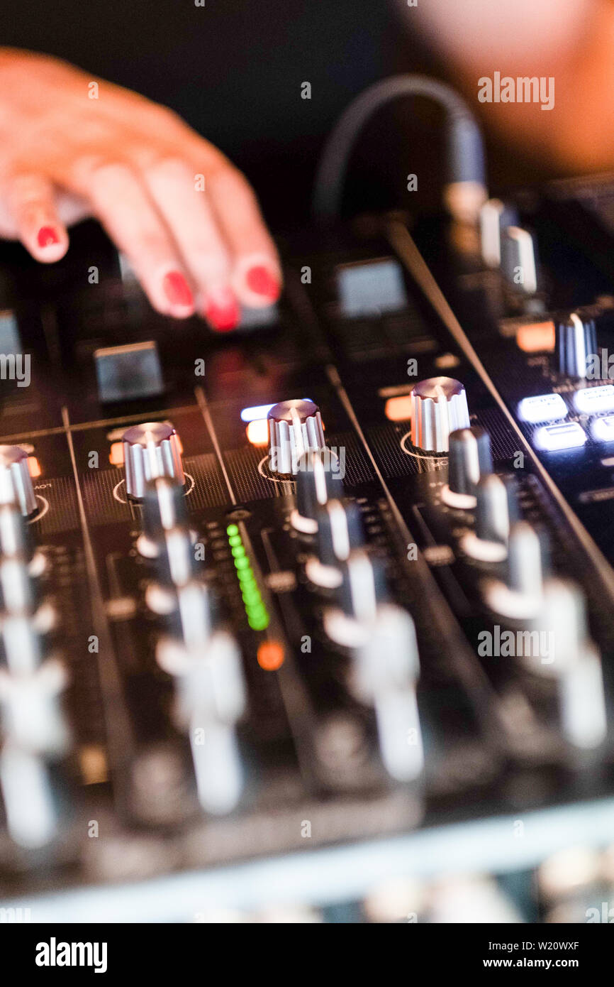 Detail of woman dj hands mixing on console. Closeup of music mixing equipment Stock Photo Alamy