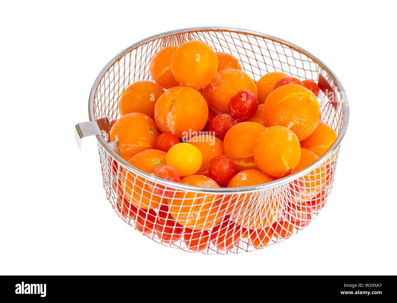 Tomatoes, frozen in refrigerator isolated on white Stock Photo Alamy
