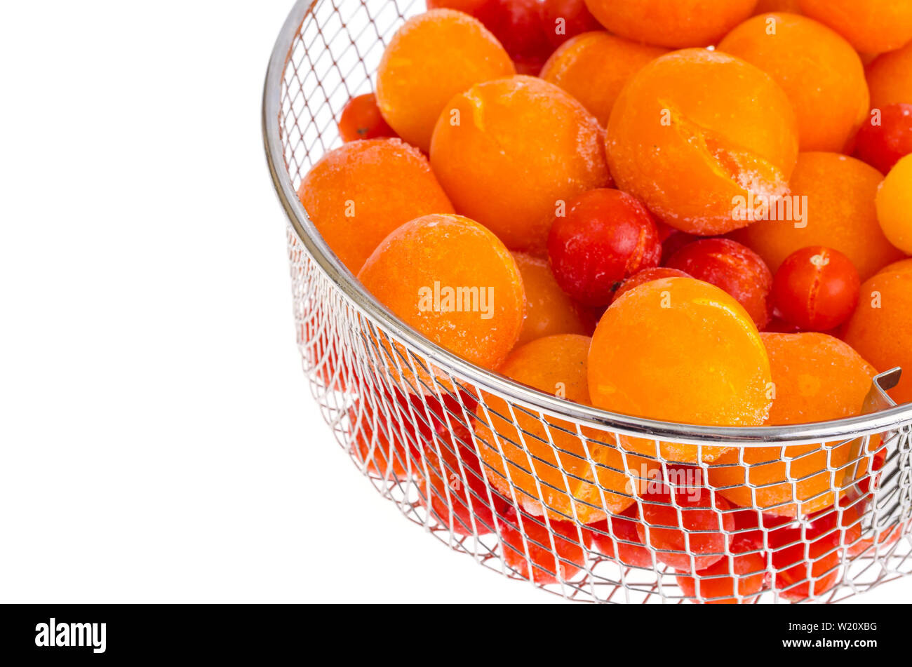 Tomatoes, frozen in refrigerator isolated on white Stock Photo Alamy