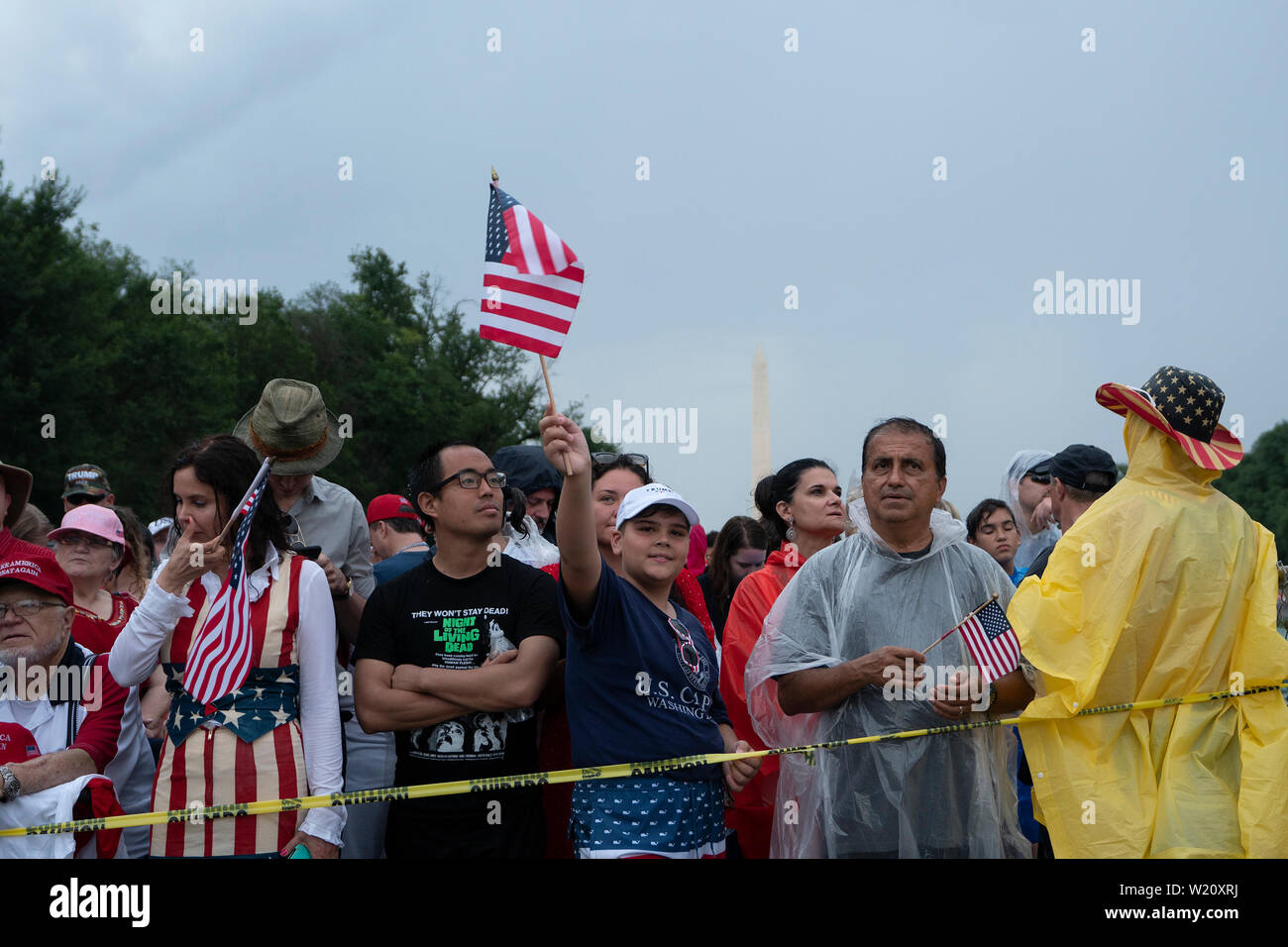 Washington, United States Of America. 04th July, 2019. Crowds gather in a stormy Washington, DC for United States President Donald J. Trump's Salute to America on July 4, 2019. Credit: Stefani Reynolds/CNP | usage worldwide Credit: dpa/Alamy Live News Stock Photo