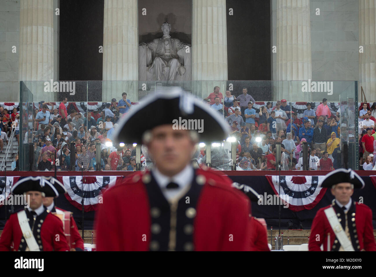 Washington, United States Of America. 04th July, 2019. Crowds gather in a stormy Washington, DC for United States President Donald J. Trump's Salute to America on July 4, 2019. Credit: Stefani Reynolds/CNP | usage worldwide Credit: dpa/Alamy Live News Stock Photo