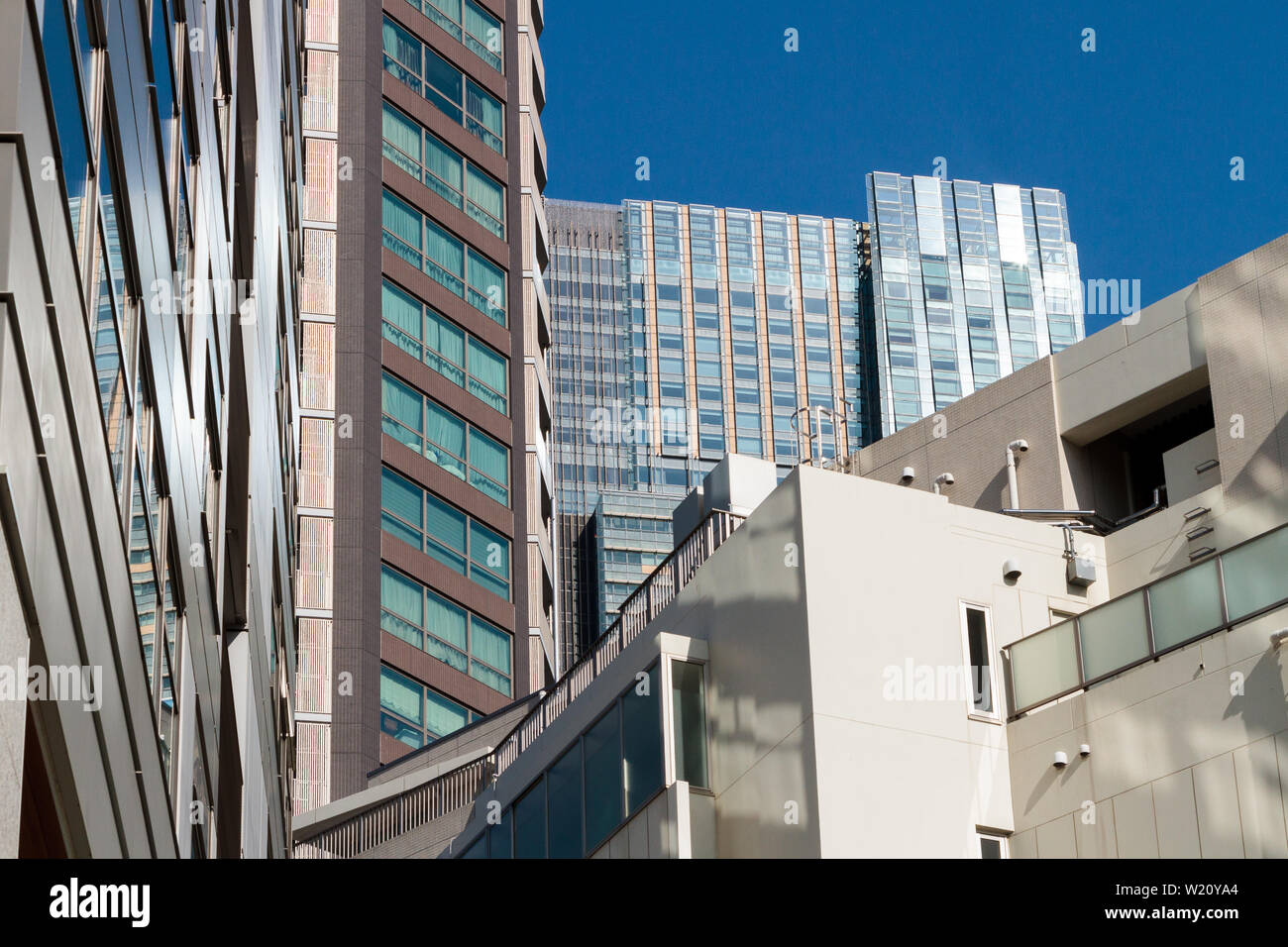 Tokyo Midtown Tower Seen Behind Other Tall Buildings In Roppongi Tokyo Japan Friday February 5th 16 Stock Photo Alamy