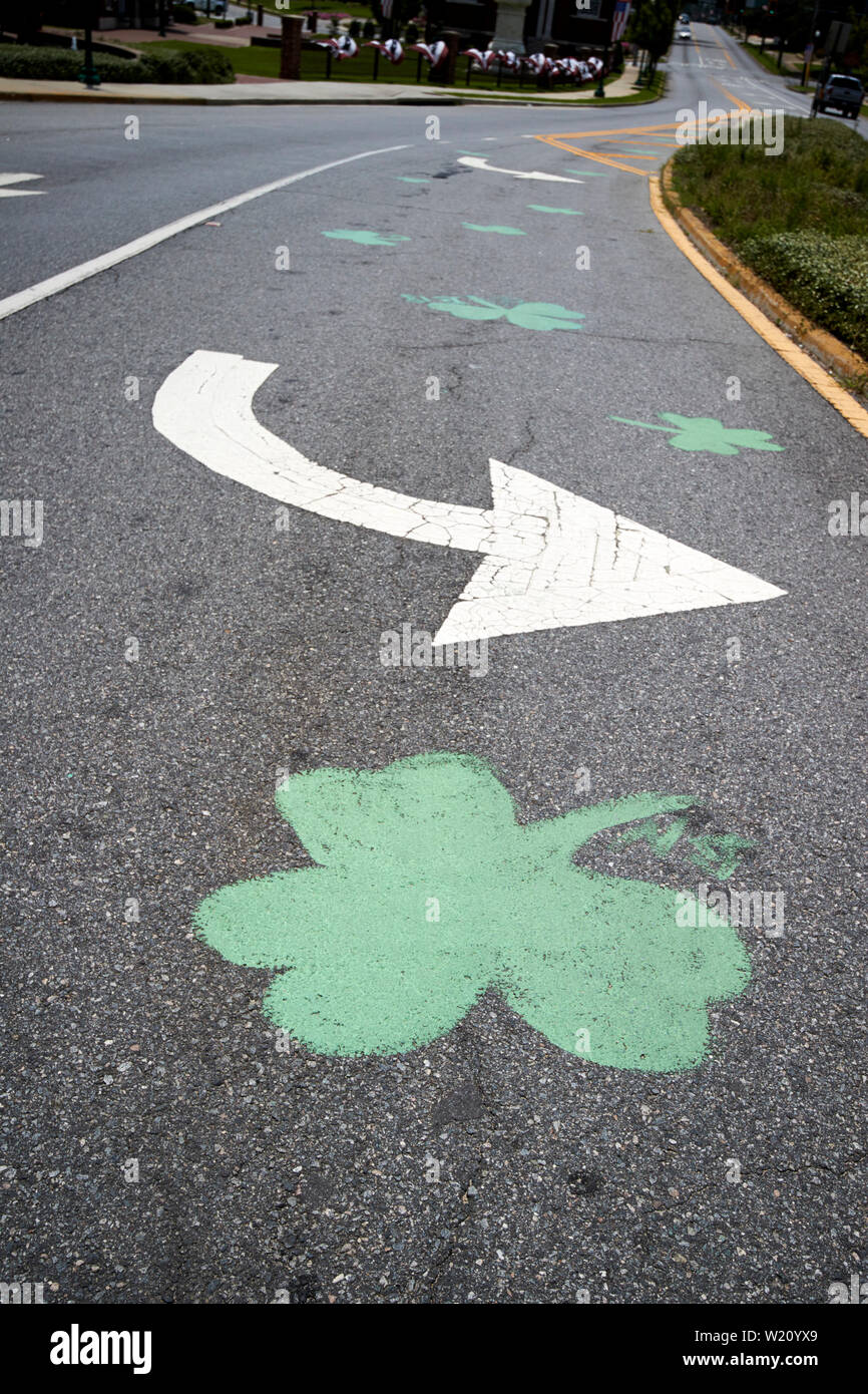 shamrocks painted in the road in Dublin Georgia USA Stock Photo