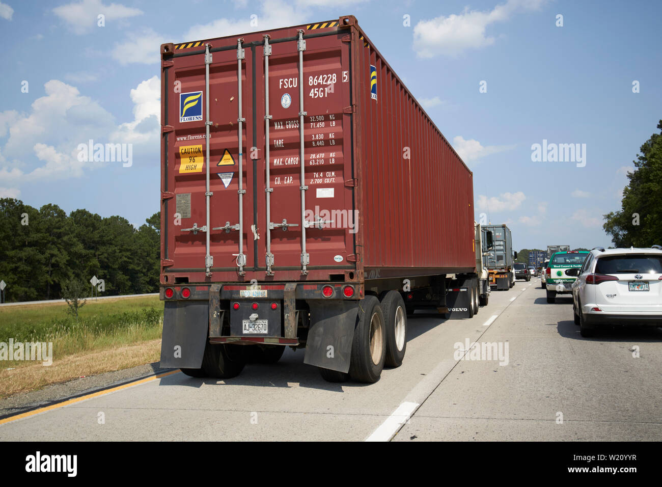 freight container on the back of a truck stuck in traffic on the interstate in georgia usa Stock Photo