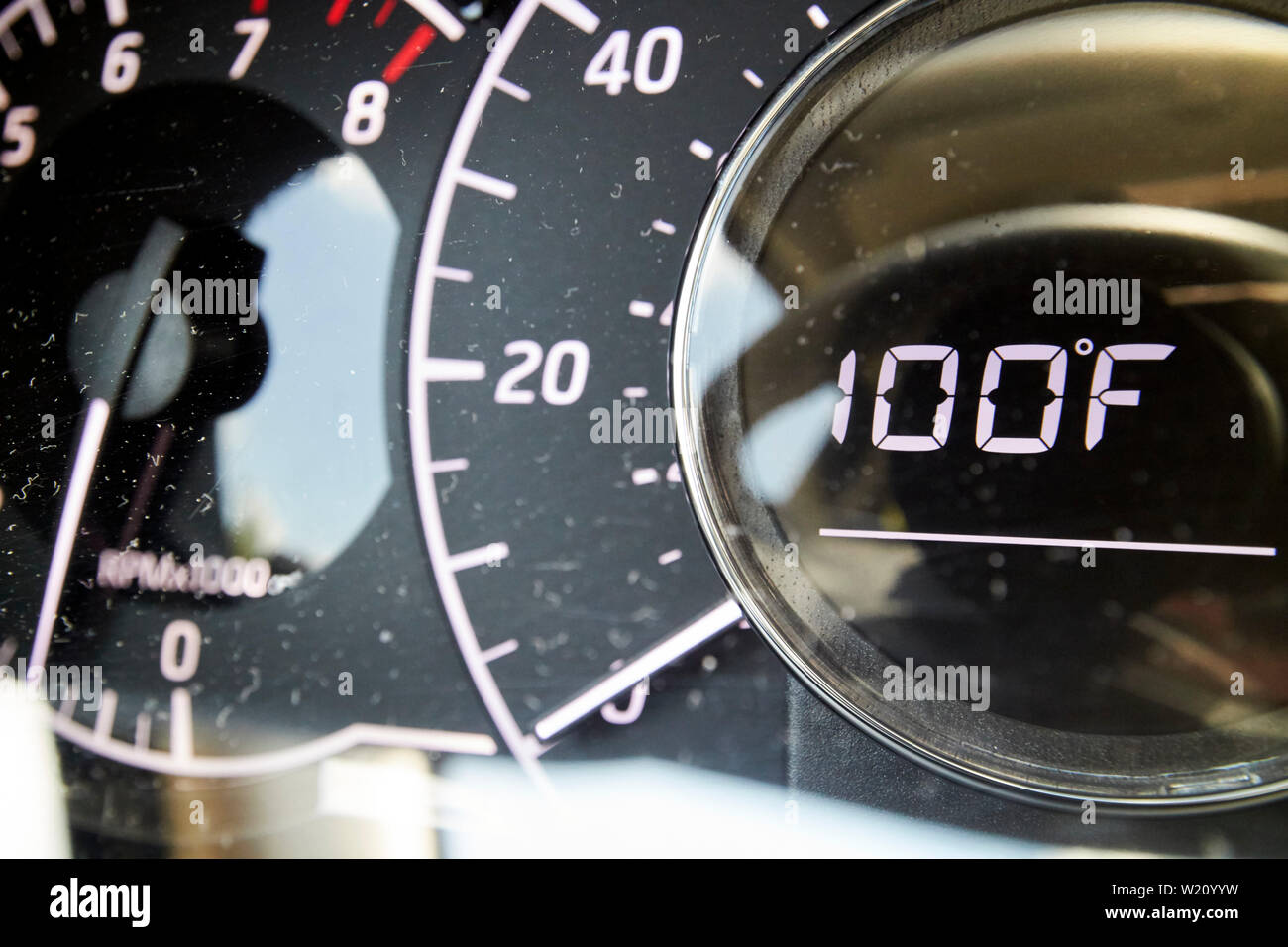 car external temperature reading 100f in the usa in a heatwave Stock Photo