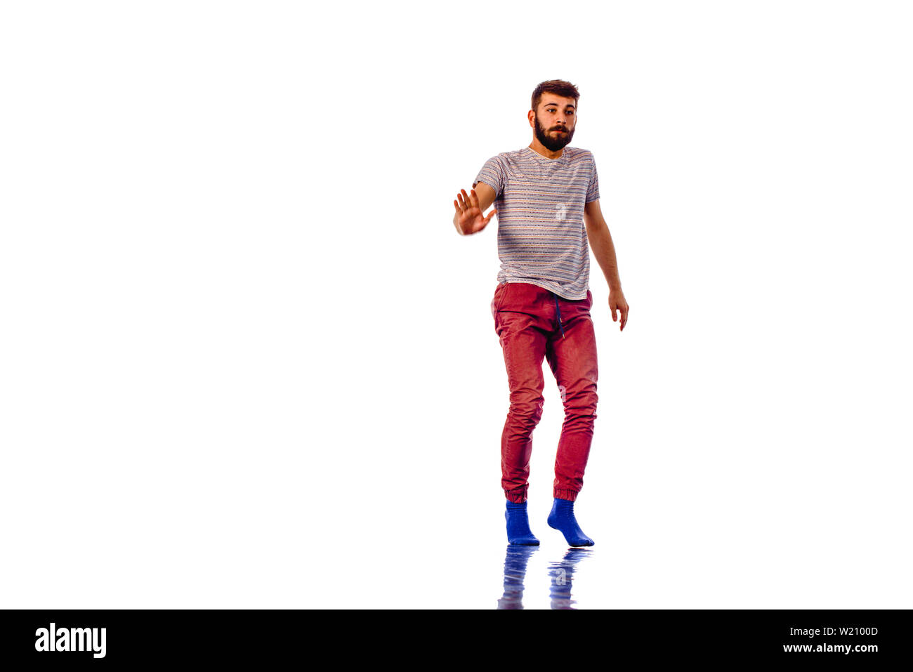 Amazing dancer is doing breakdance on a white background Stock Photo