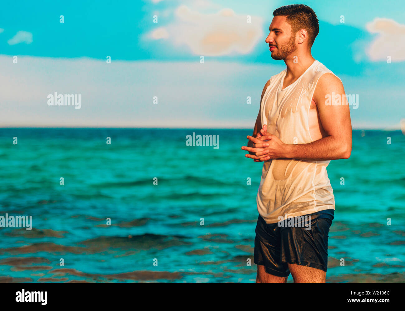 Beach Man Looking At Ocean Enjoying View Standing Handsome Fit Male Fitness Model On Beautiful 