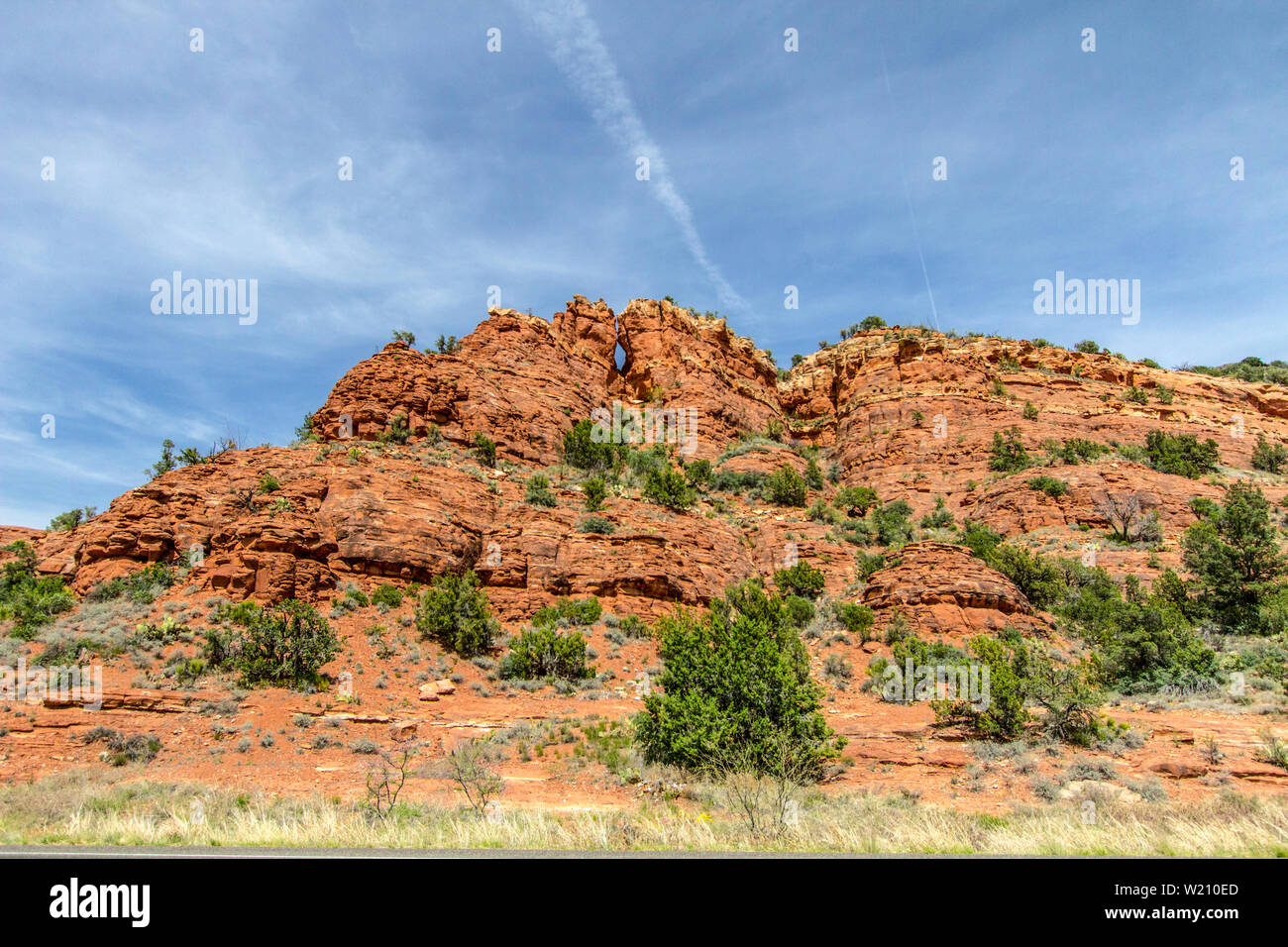 Arizona Desert Landscape. Large red rock butte in the high desert of Sedona Arizona in the American Southwest Stock Photo