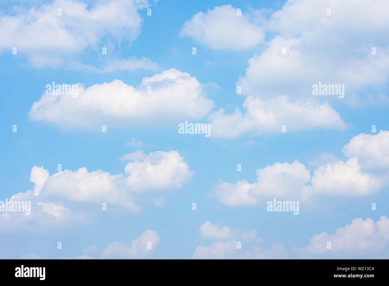 The beauty of the sky with clouds and the sun. Stock Photo