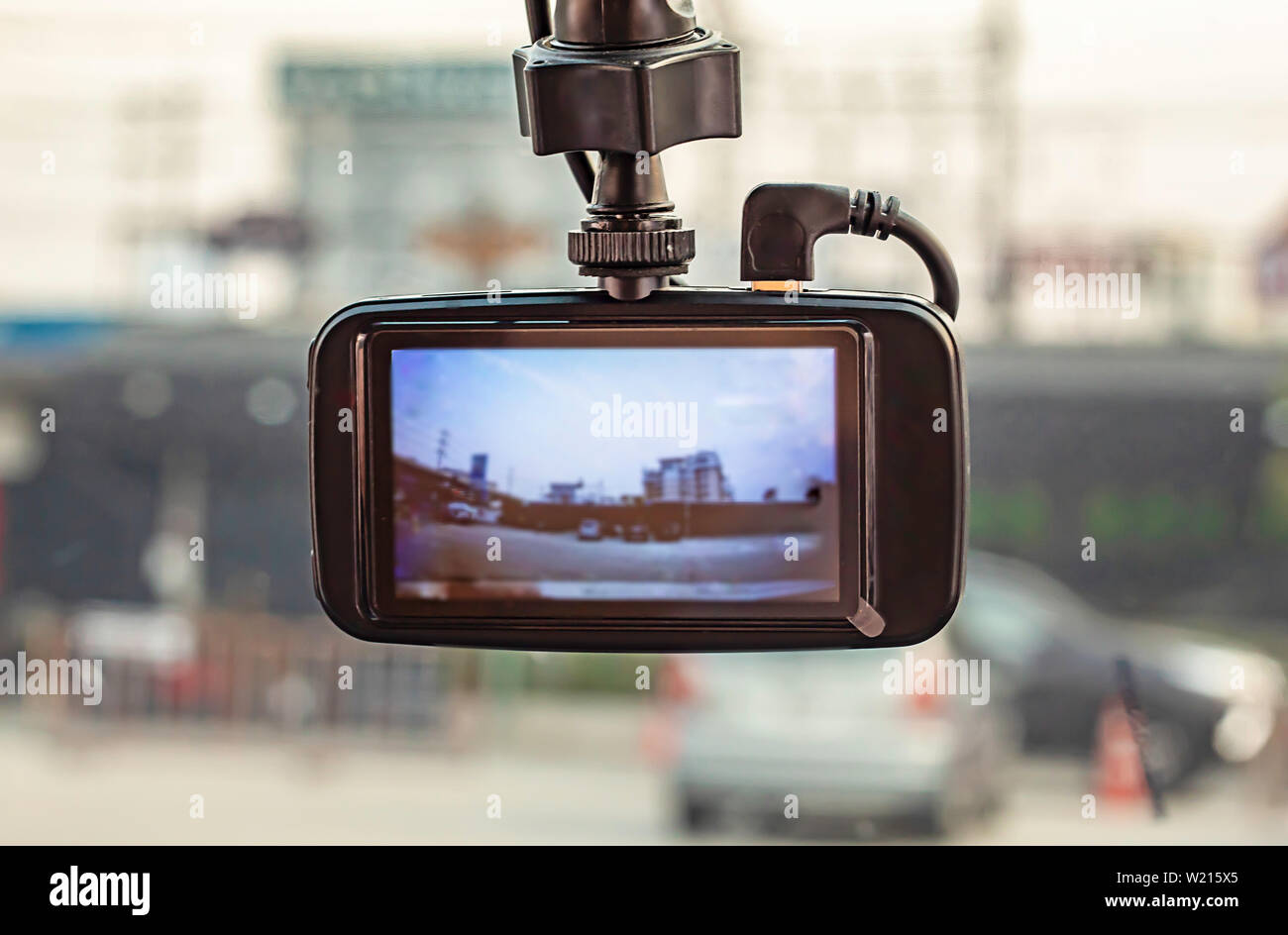Buildings and cars photos on camera in car Stock Photo Alamy