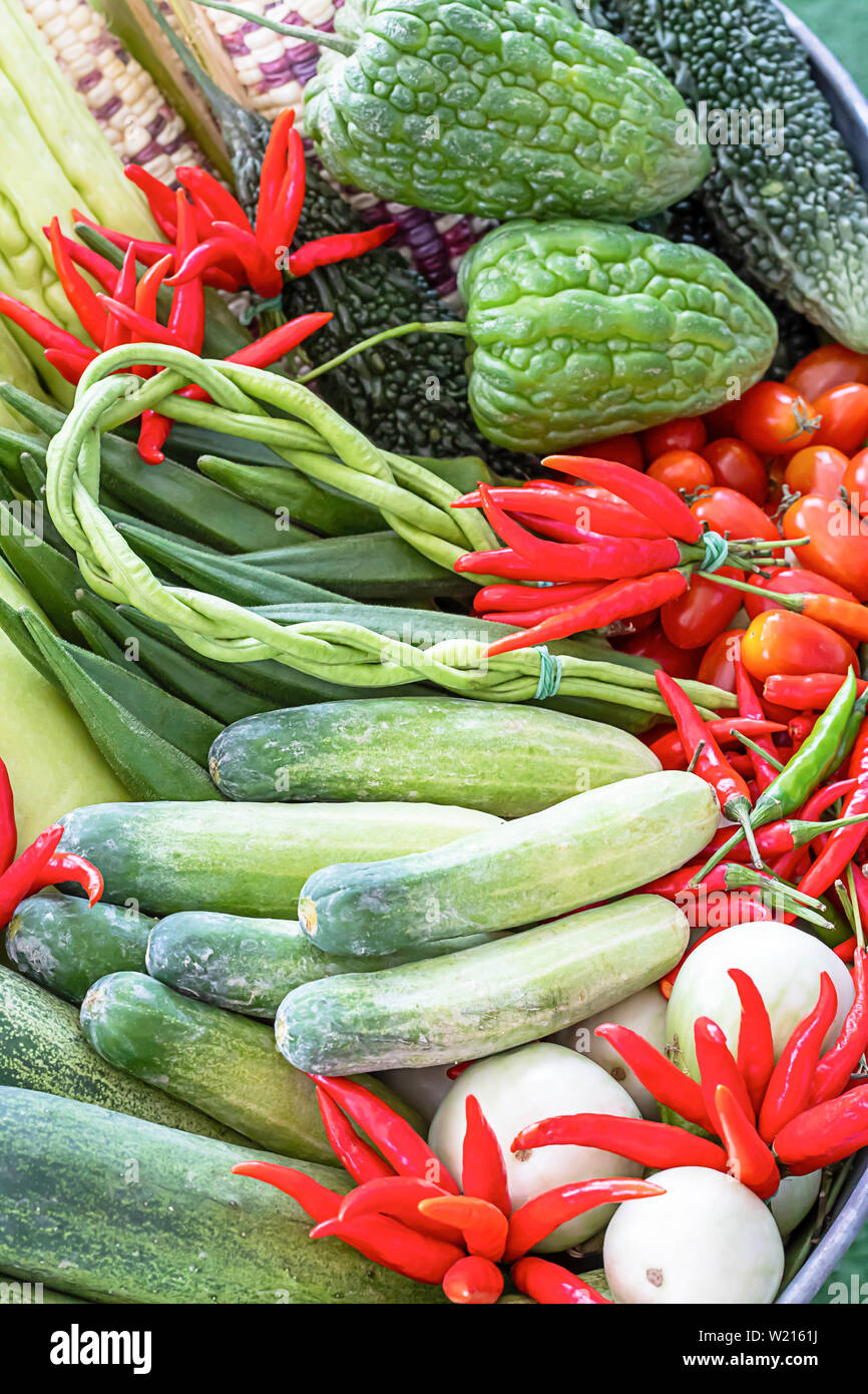 Vegetables in Thailand Cucumber , Tomato , Bitter gourd and red chilli