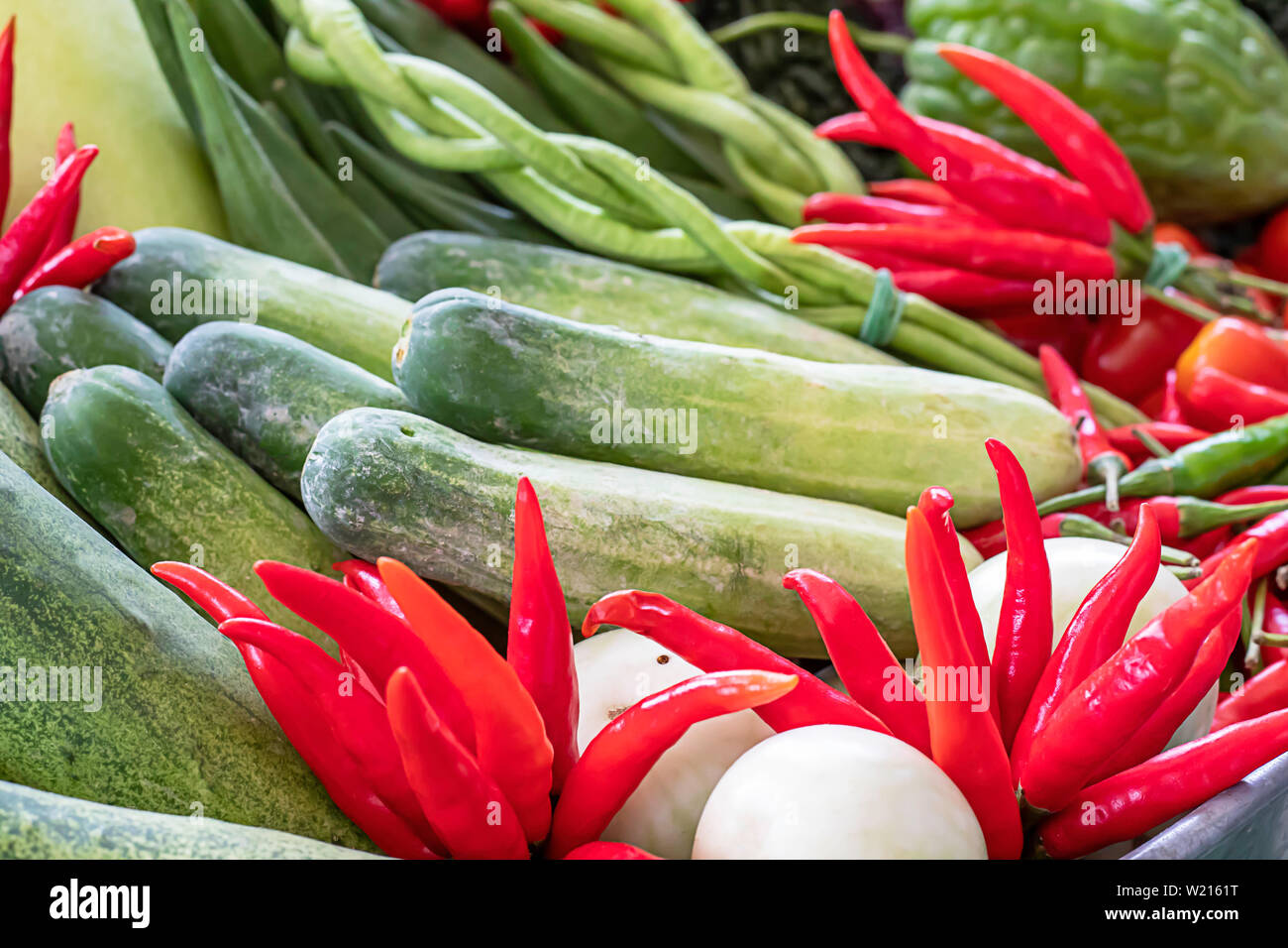 Vegetables in Thailand Cucumber , Tomato , Bitter gourd and red chilli