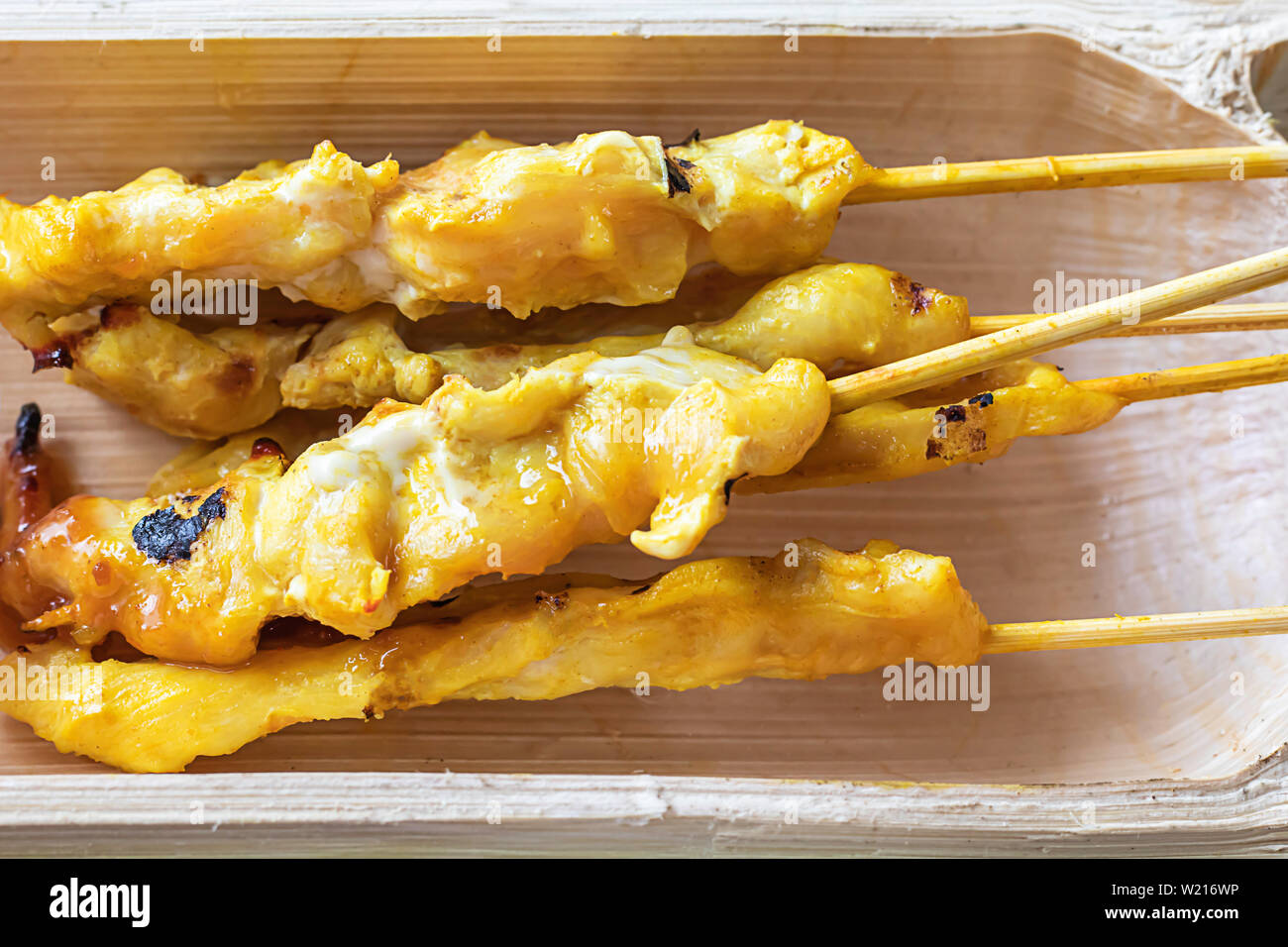 Pork Satay with coconut milk in bamboo Stock Photo Alamy
