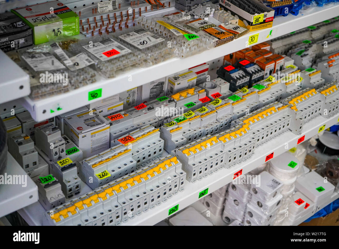 Chelyabinsk Region, Russia - June 2019. Electrical goods store. Sale of electrical switches. Switches on the shelf in a department store electrical Stock Photo