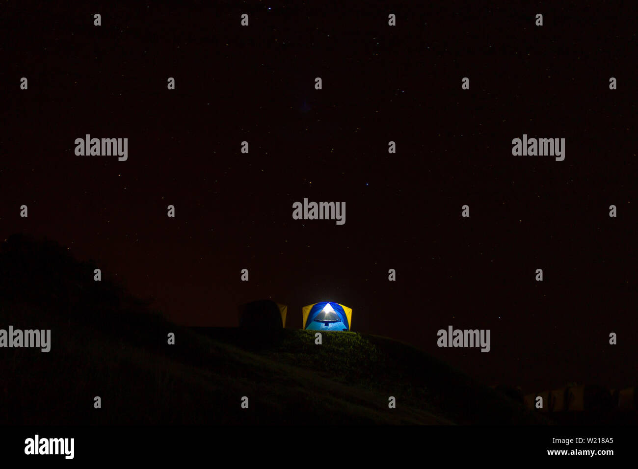 Tent and background sky and the stars at night Stock Photo - Alamy