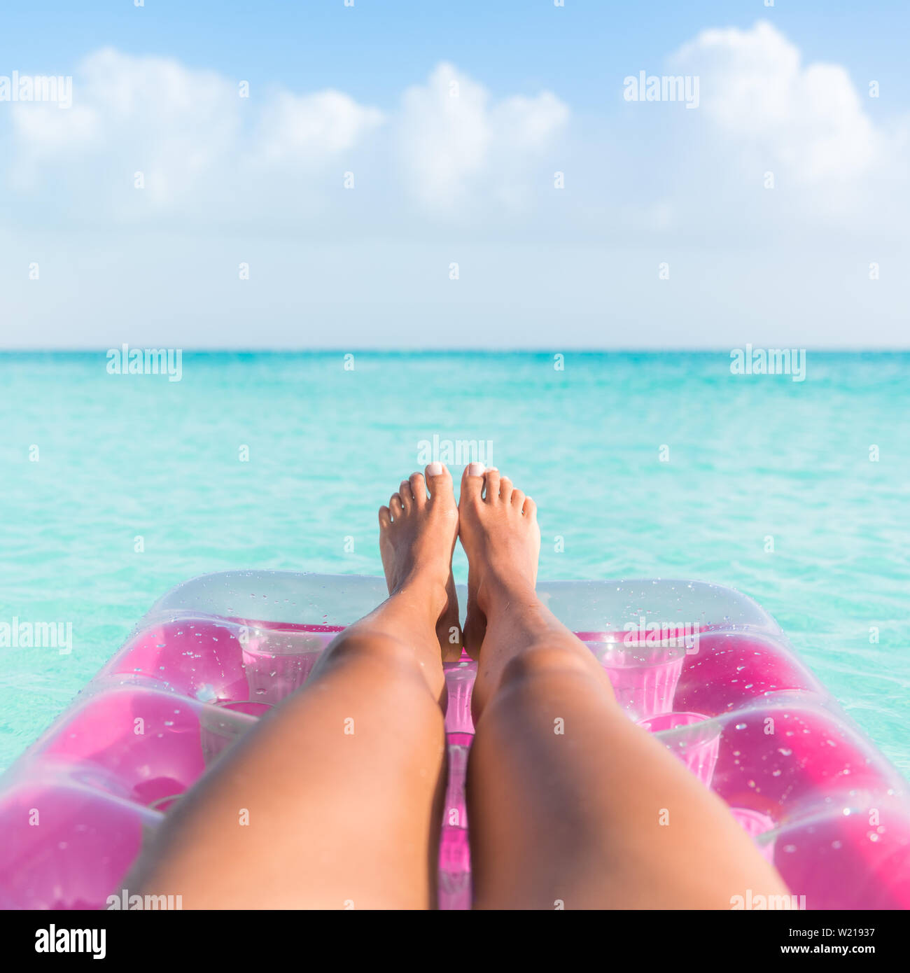 Woman legs beach lying hi-res stock photography and images - Alamy