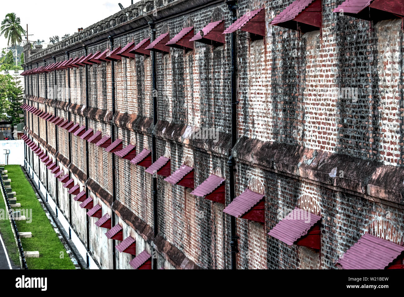 Back Perspective view of Cellular Jail cells & wall, used to exile political prisoners taking part in Indian Freedom Struggle in 19th and 20th century Stock Photo