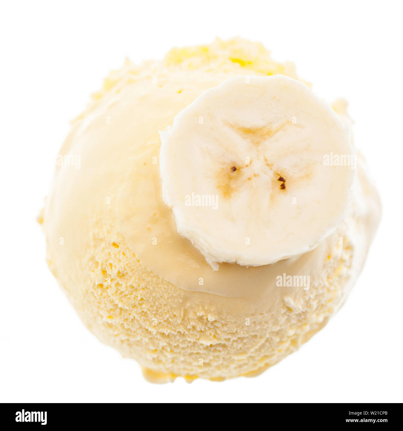 A scoop of banana ice cream with banana slice from the top Stock Photo