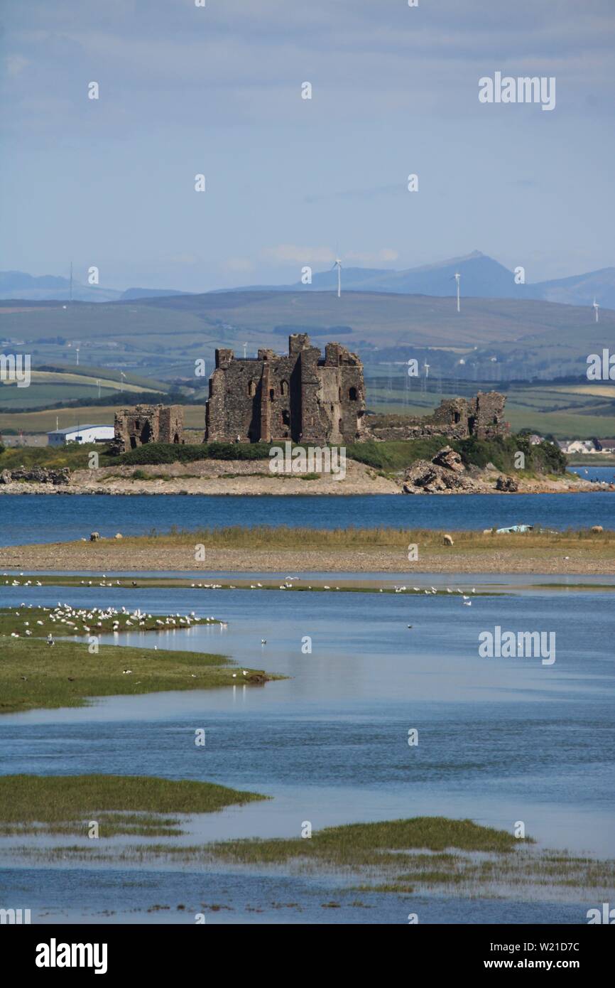 Piel Island and Piel Castle viewed from South Walney Nature Reserve, Walney Island, Barrow-In-Furness, Cumbria UK England. Furness Peninsula Summer. Stock Photo