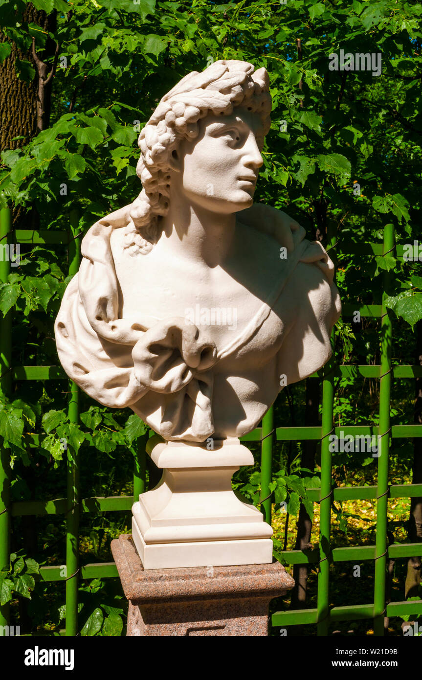 Summer garden, St Petersburg, Russia. The bust sculpture of Apollo, the