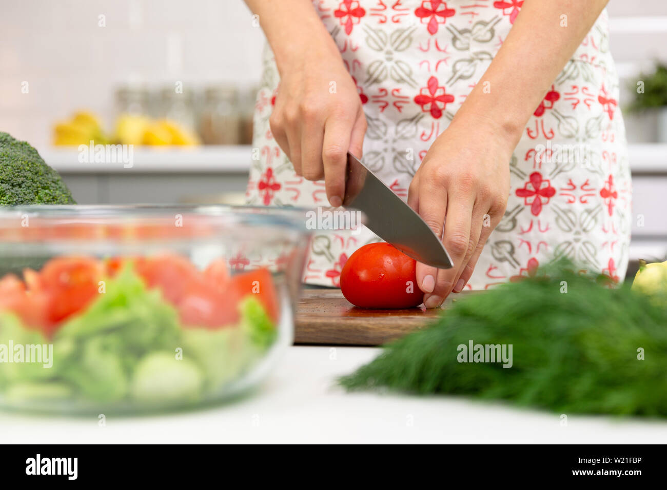 Woman preparing delicious and healthy food in the home kitchen. Healthy diet concept Stock Photo