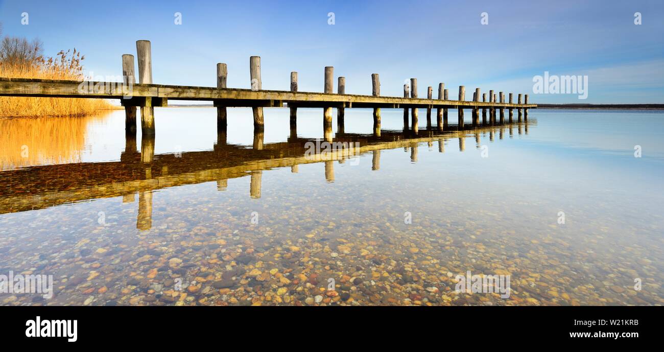 Clear, quiet lake with jetty, Lake Wallendorf, Saxony-Anhalt, Germany Stock Photo