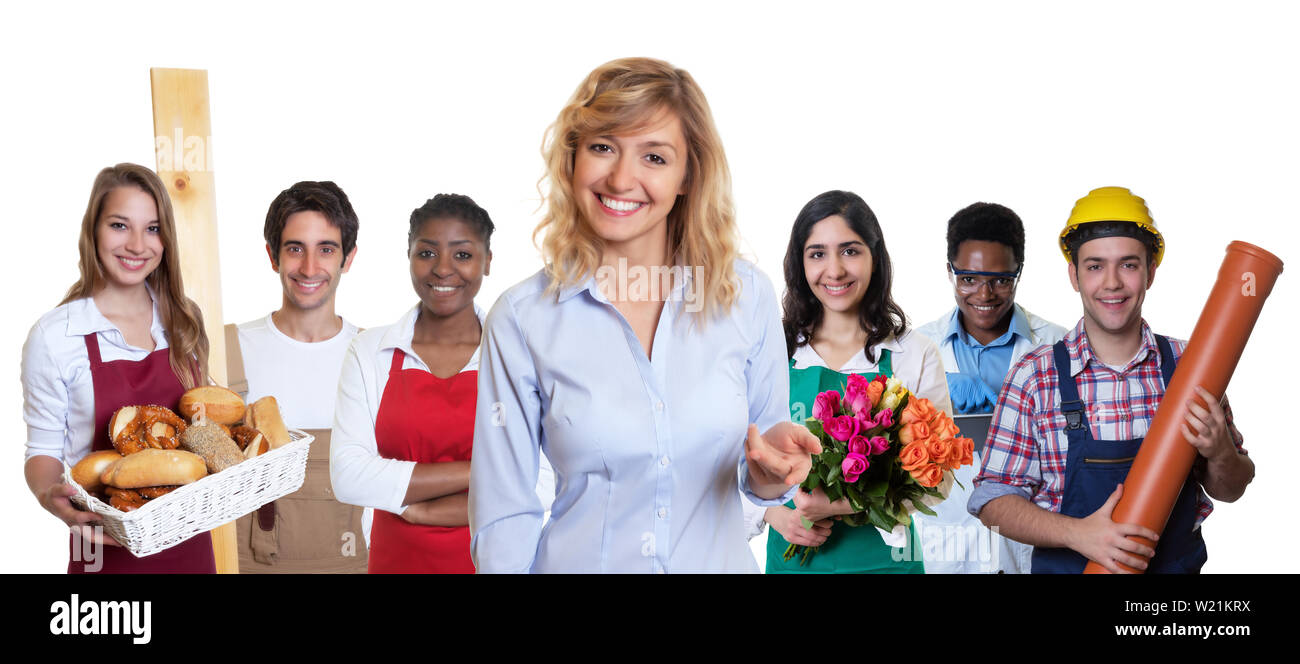 Blond female business trainee with group of other international apprentices on an isolated white background for cut out Stock Photo