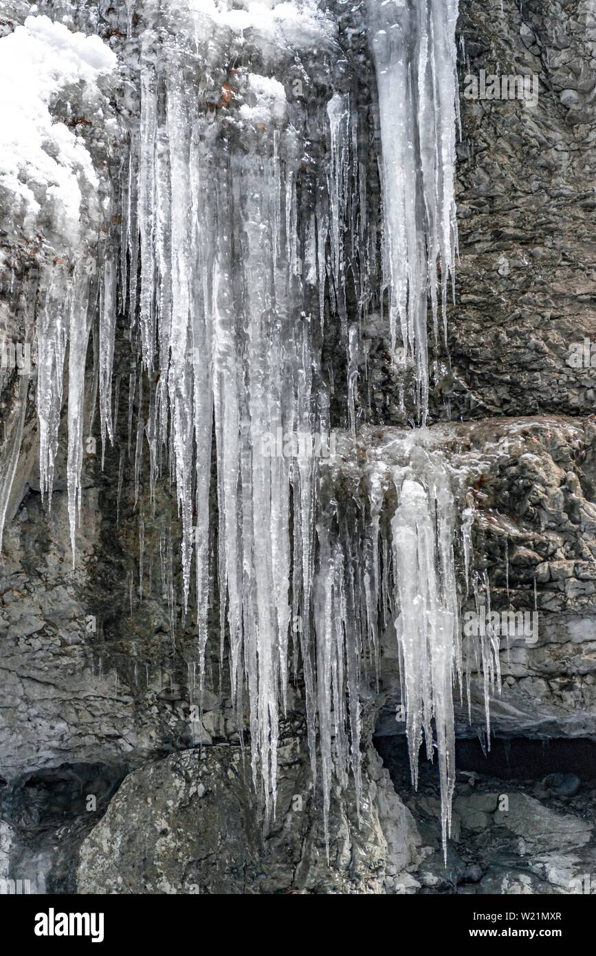Long icicles on a rock face, Partnachklamm in winter, near Garmisch-Partenkirchen, Upper Bavaria, Bavaria, Germany Stock Photo