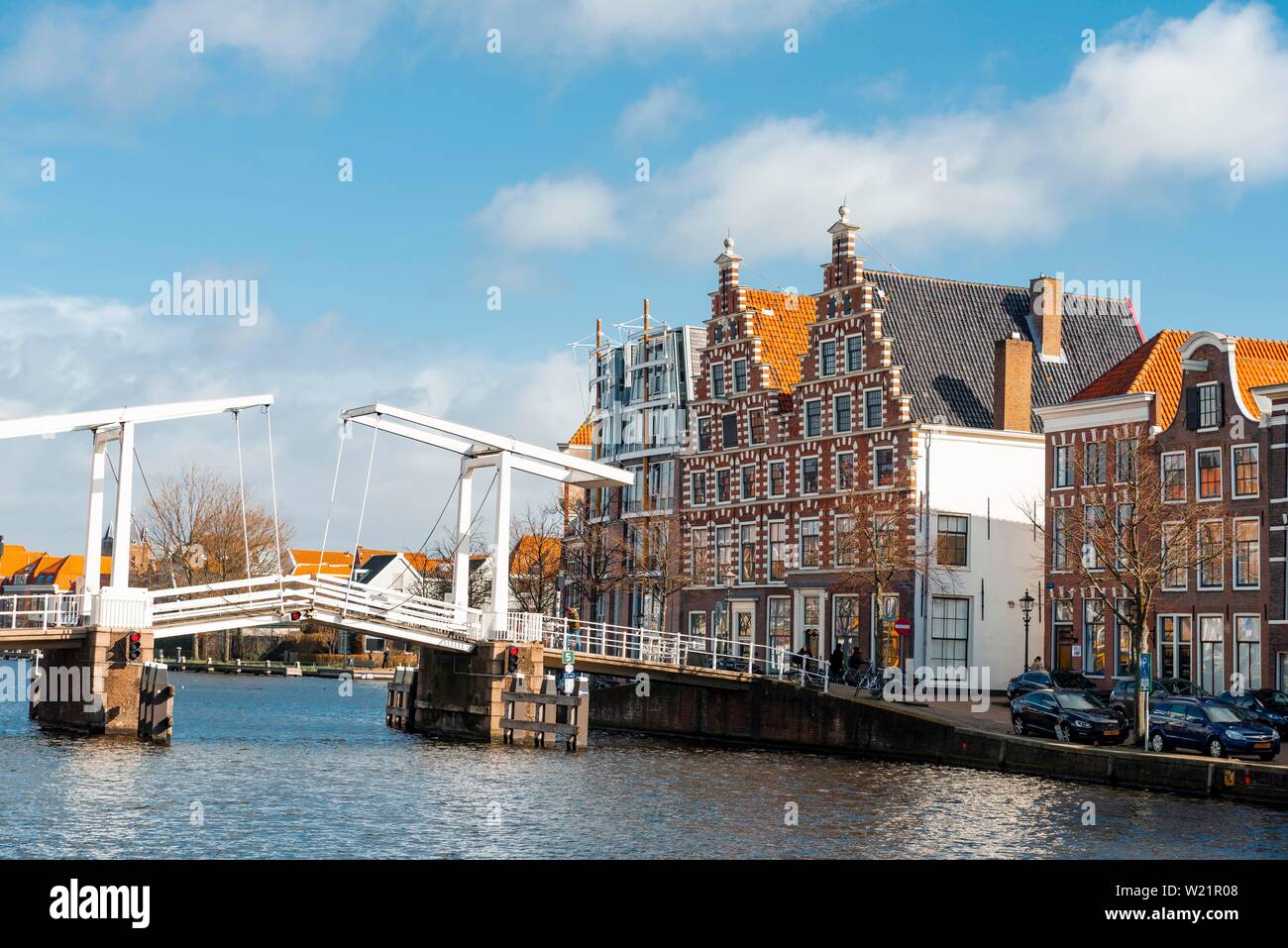 Drawbridge over river Binnen Spaarne, historic houses, Haarlem, province of North Holland, Holland, Netherlands Stock Photo