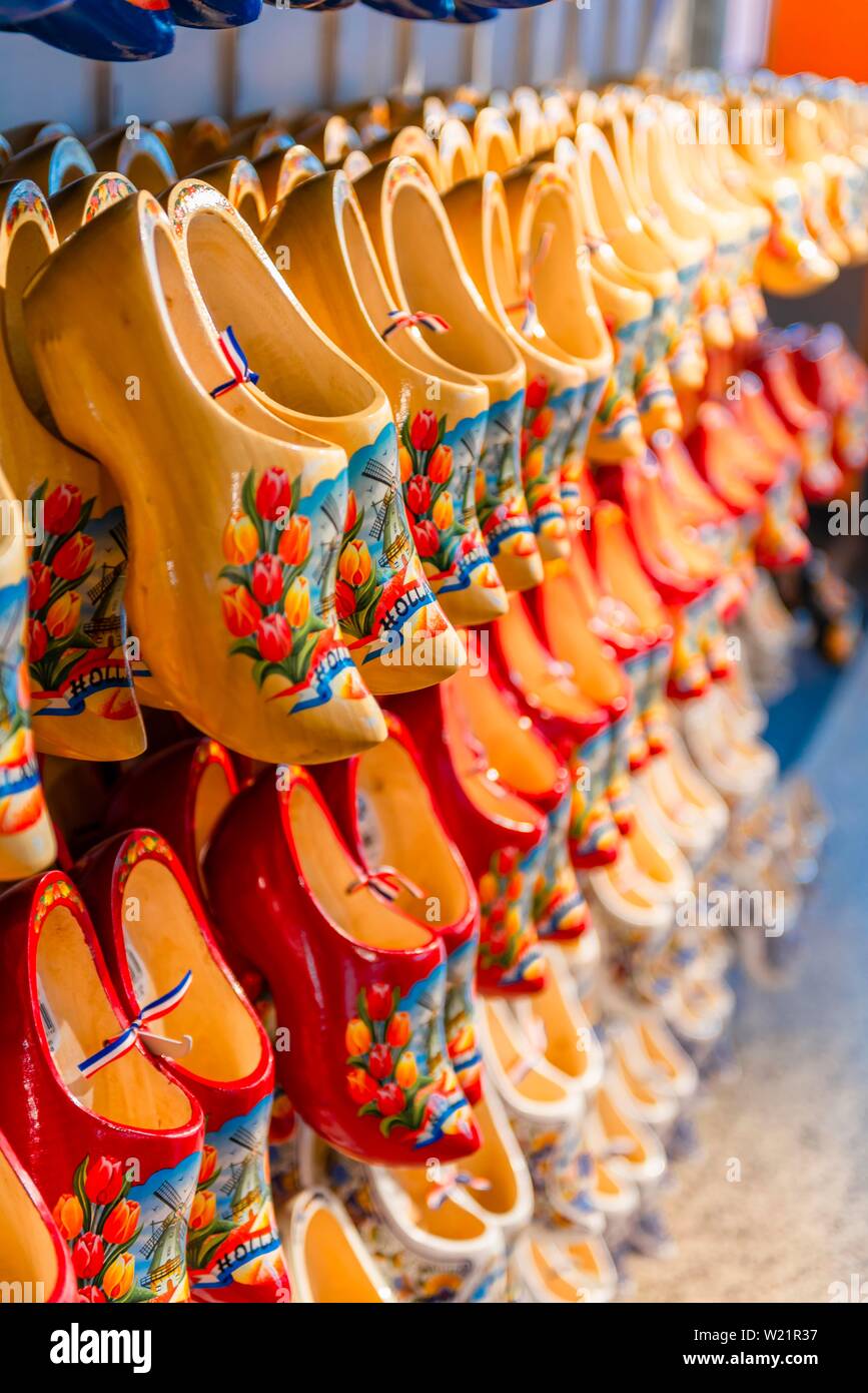 Traditionally colorfully painted Dutch wooden shoes for sale, Holzclogs, Amsterdam, Nordholland, Netherlands Stock Photo