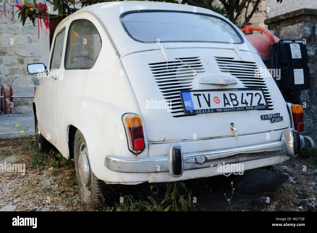 Vintage Zastava 750s old car parked in a urban scenario. Montenegro Stock Photo