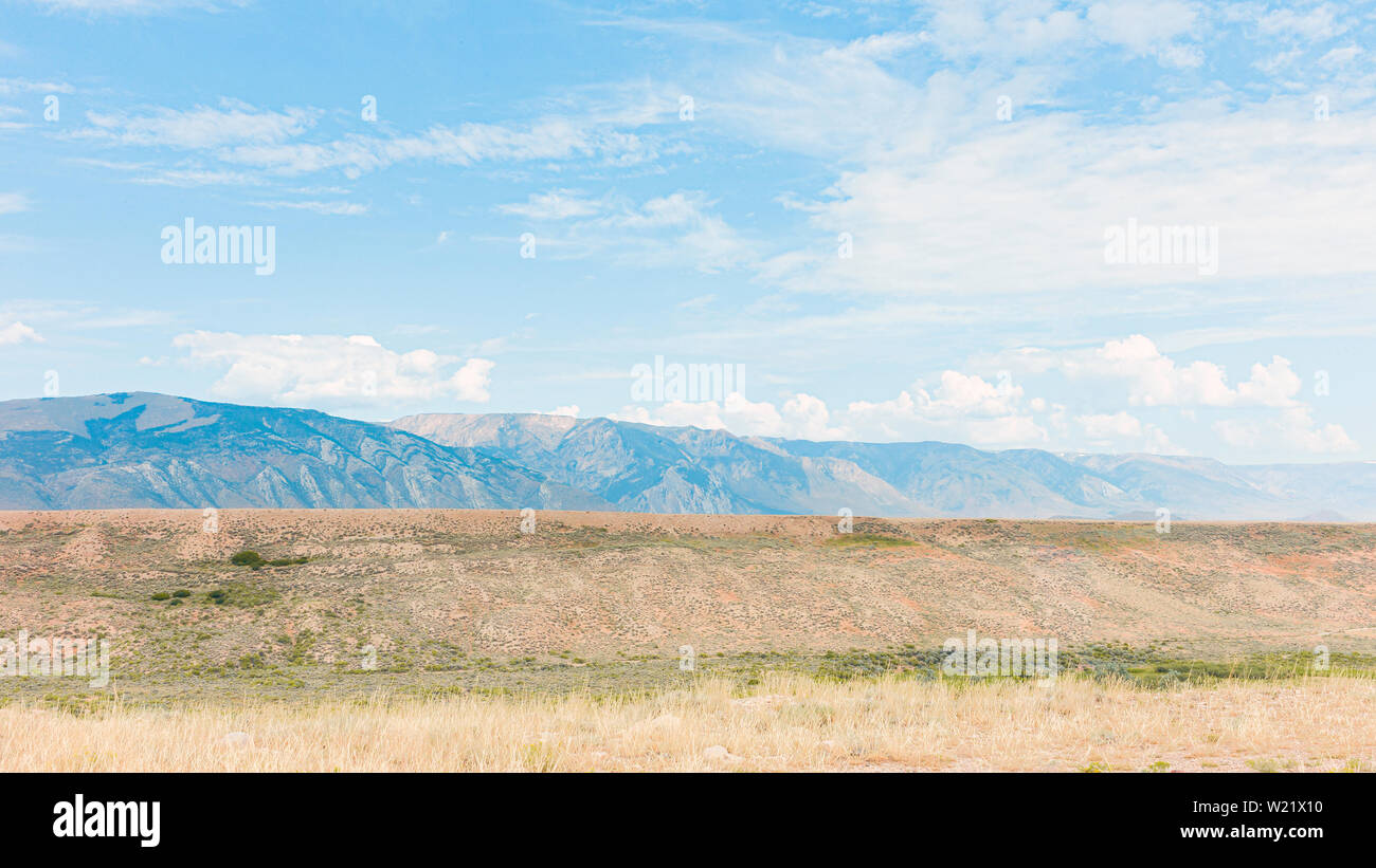 Foothills of Bear Tooth Mountains , the Rockies,at dawn on a summer day with arid prairie, Red Lodge, Montana, USA. Stock Photo