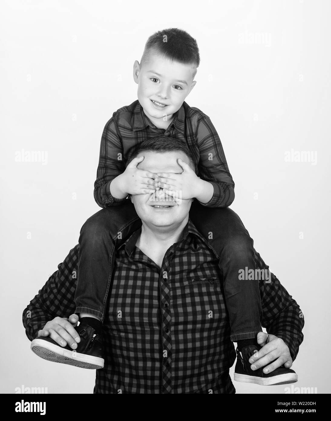 guess who. childhood. parenting. little boy with dad man. happy family.  fathers day. father and son in red checkered shirt. Young perfectionist.  keep secret. feeling playful. play together Stock Photo - Alamy
