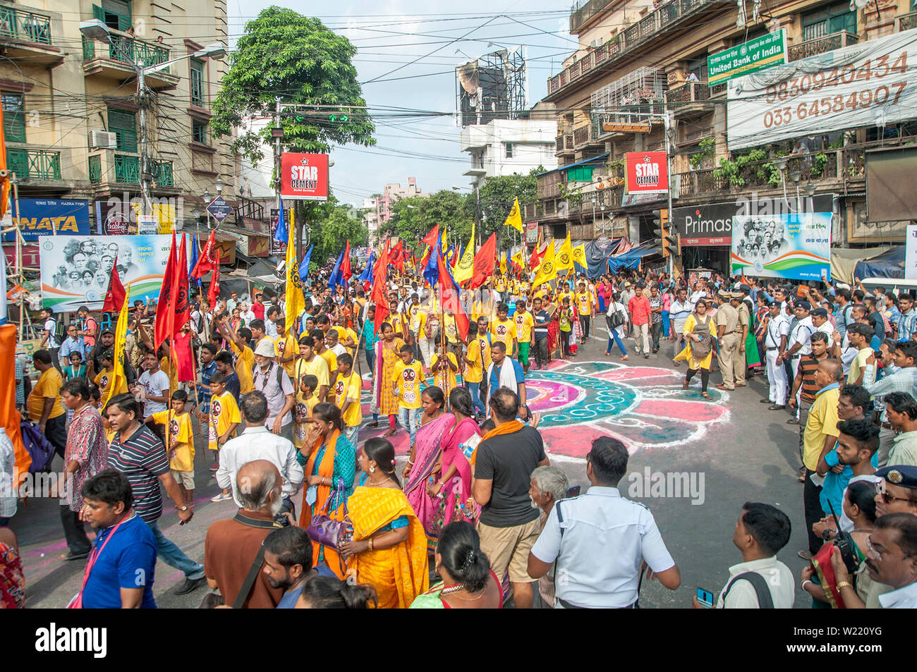 Ratha Jatra, also referred to as Rathayatra or Chariot festival is  public procession in a chariot. The term particularly refers to the annual Rathajatra in Odisha, Jharkhand, West Bengal and other East Indian states, particularly the Odia festival that involve a public procession with a chariot with deities Jagannath (Vishnu avatar), Balabhadra (his brother), Subhadra (his sister) and Sudarshana Chakra (his weapon) on a ratha, a wooden deula-shaped chariot. It attracts over a million Hindu pilgrims who join the procession each year. (Photo by Amlan Biswas/Pacific Press) Stock Photo