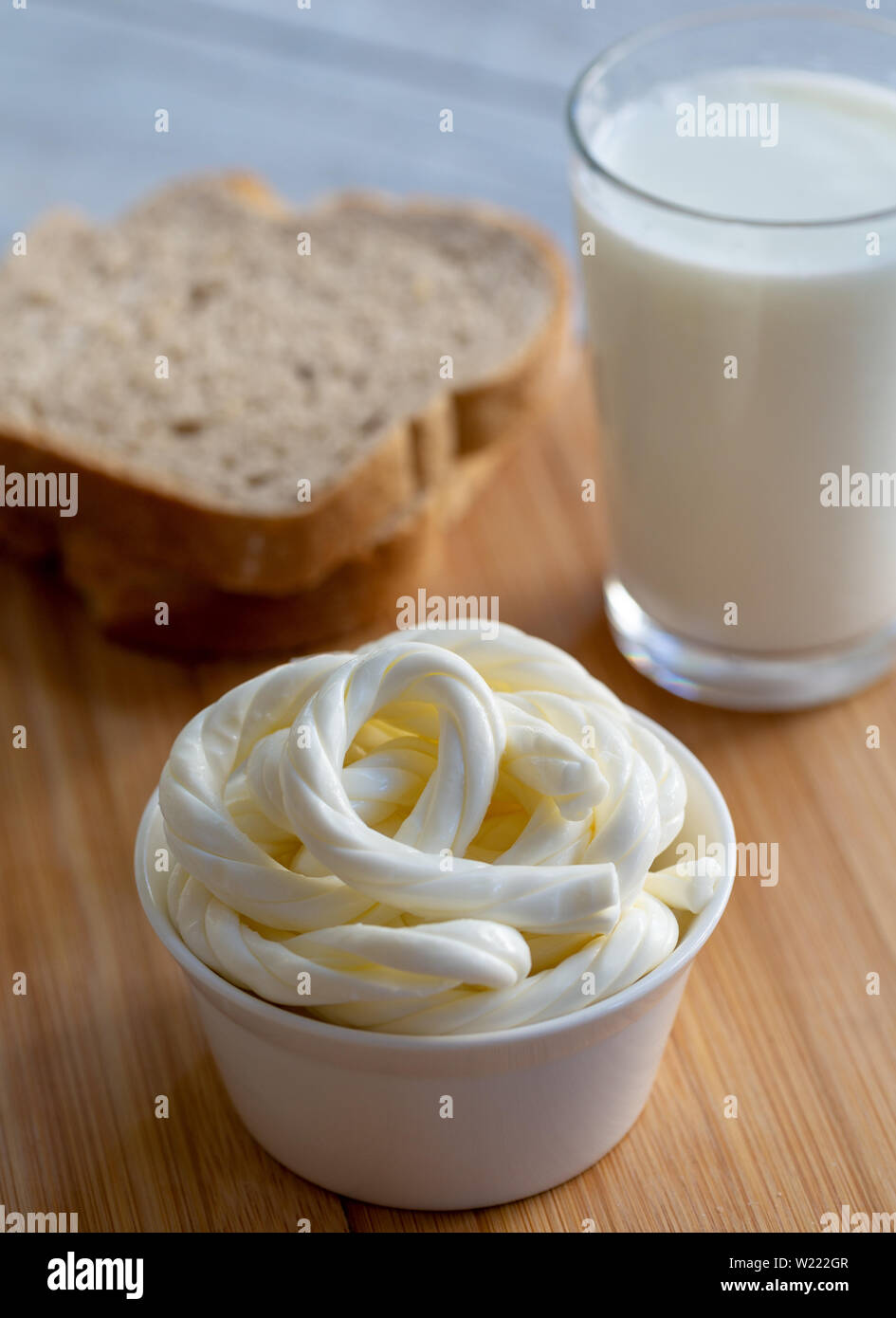 Turkish Knitting Cheese or rope cheese and glass of milk Stock Photo