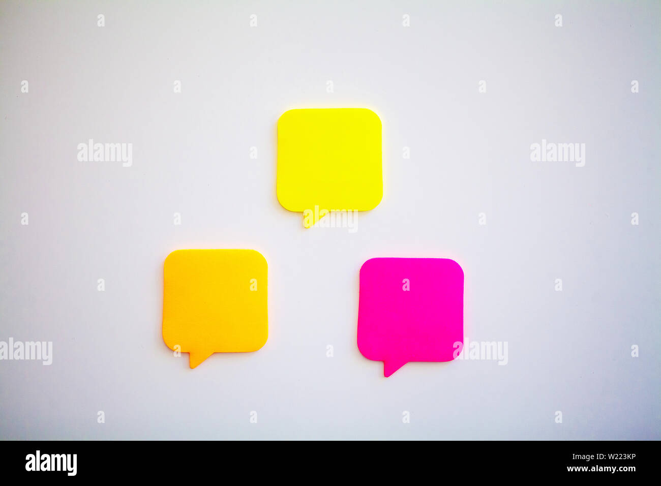 Colorful stickers on white wall. Empty Space for text Stock Photo - Alamy