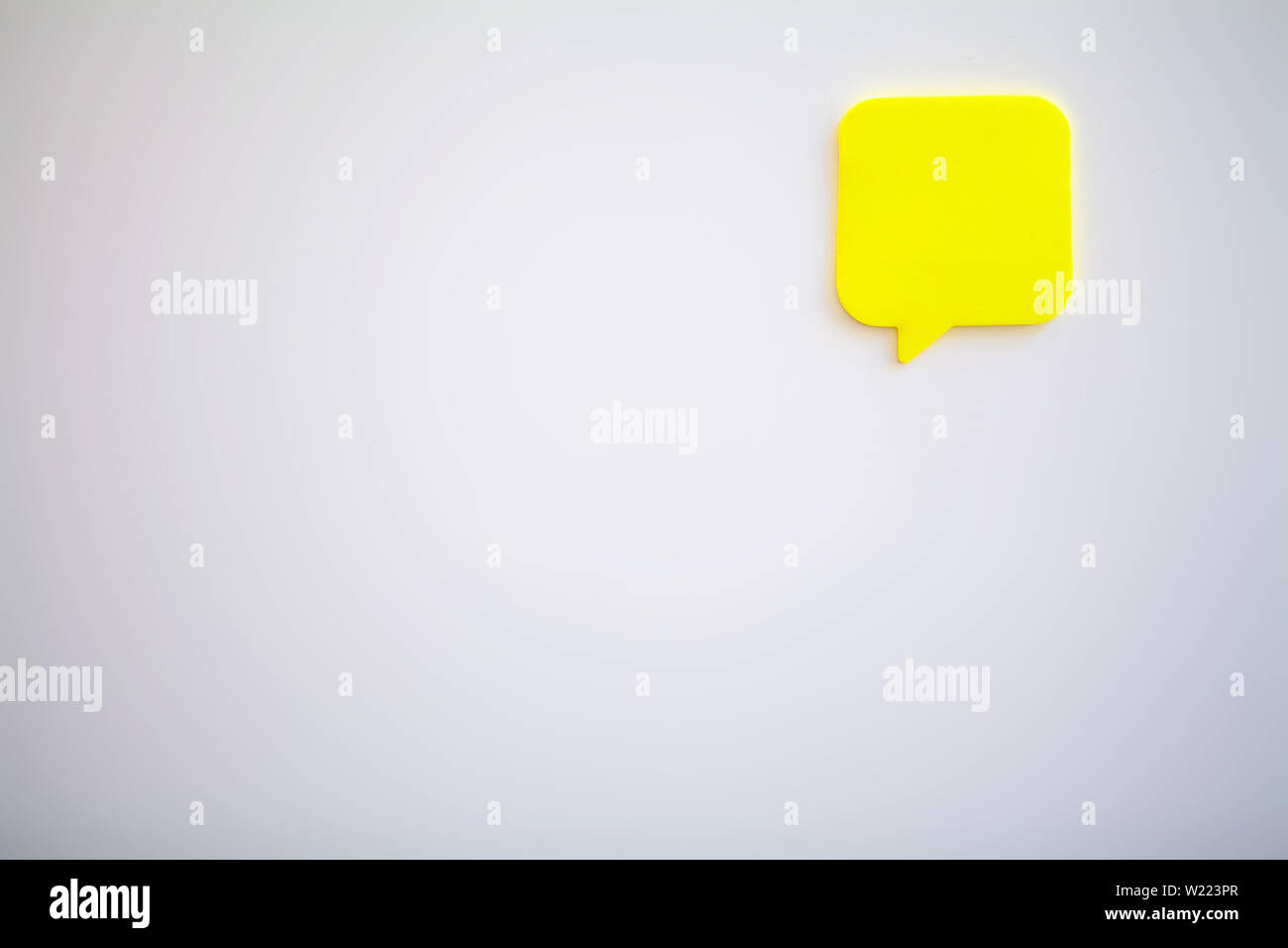 Stickers on white wall. Empty Space for text Stock Photo - Alamy