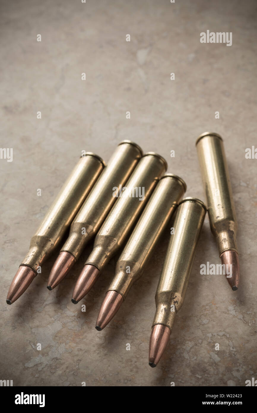 Six .270 rifle cartridges equipped with soft-nosed expanding bullets ...