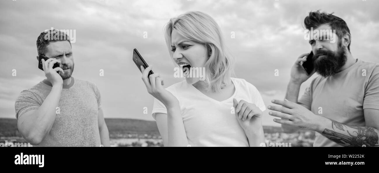 Portrait of busy people talking on the mobile phone. Stock Photo