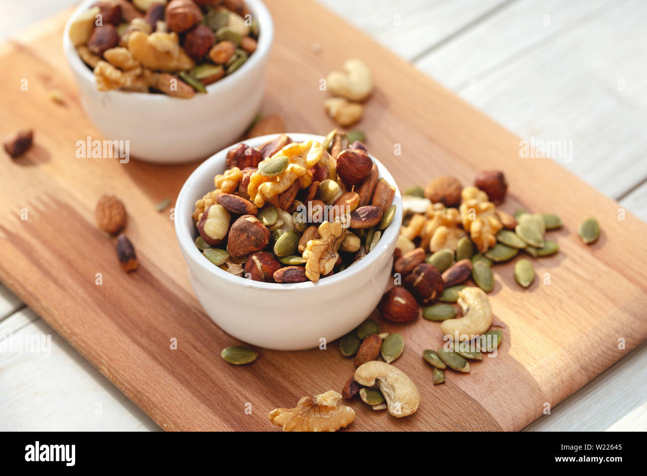 Bowl of nuts mix on wooden background Stock Photo Alamy