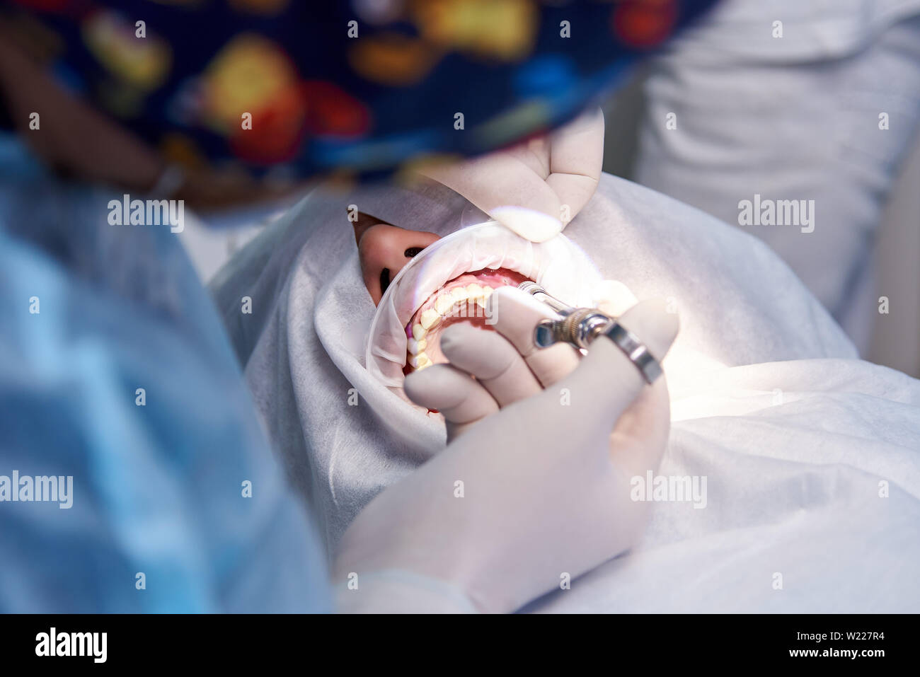 Surgery in the dental clinic. Anesthesia in dental surgery Stock Photo