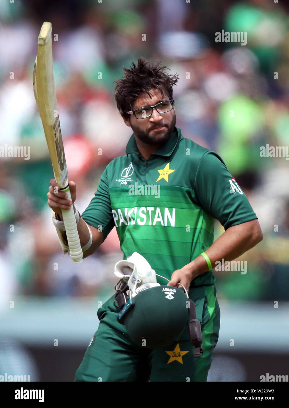 Pakistan's Imam-ul-Haq leaves the field after losing his wicker during the ICC Cricket World Cup group stage match at Lord's, London. Stock Photo