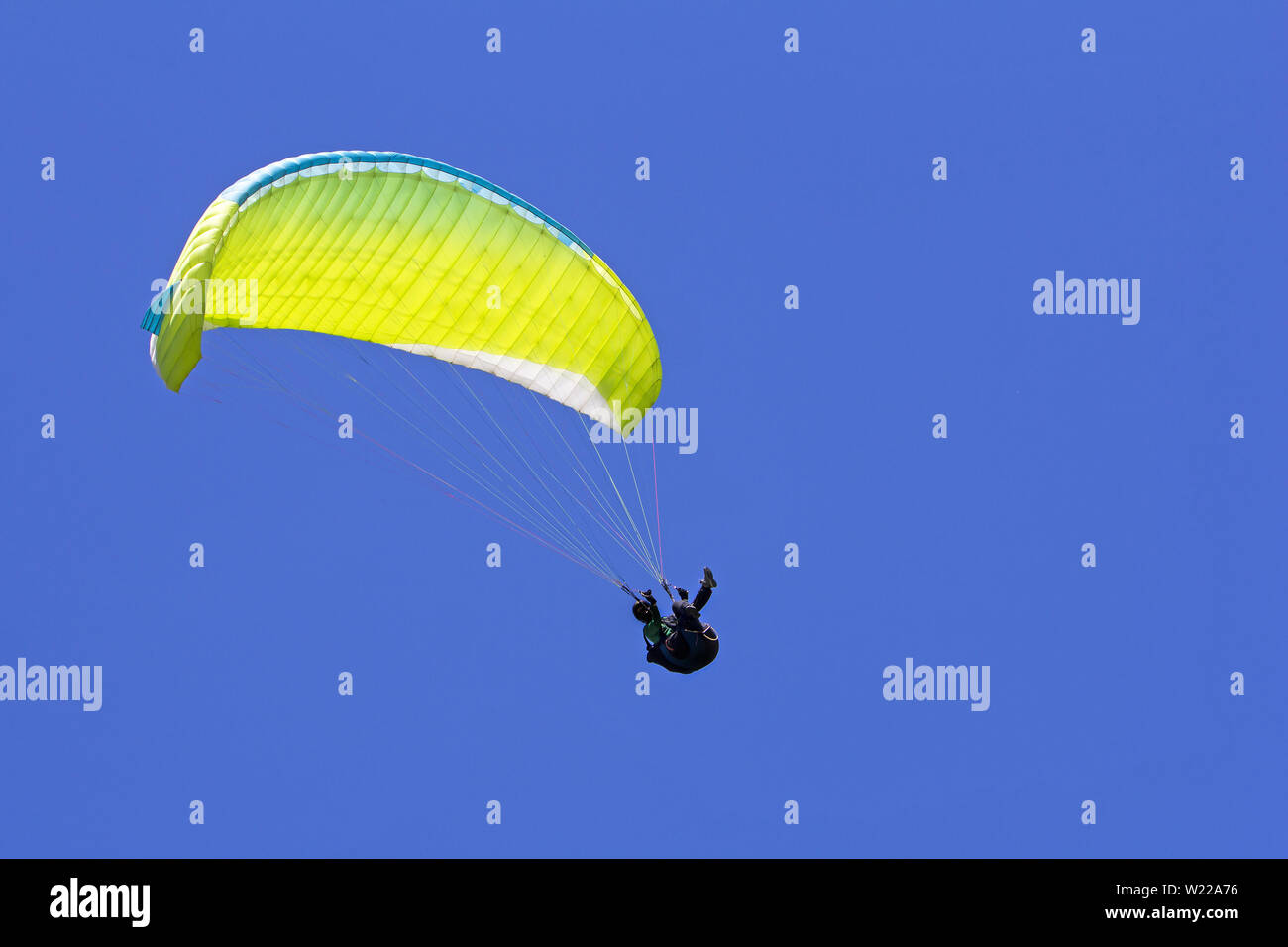 Paragliding in the blue sky as background extreme sport Stock Photo