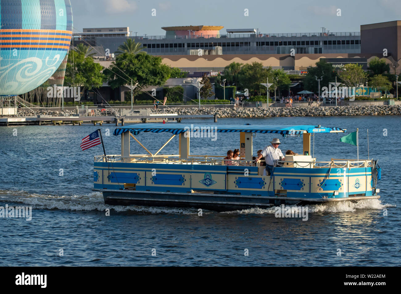 Orlando, Florida. June 15, 2019. Taxi boat sailing in Disney Springs at Lake Buena Vista Stock