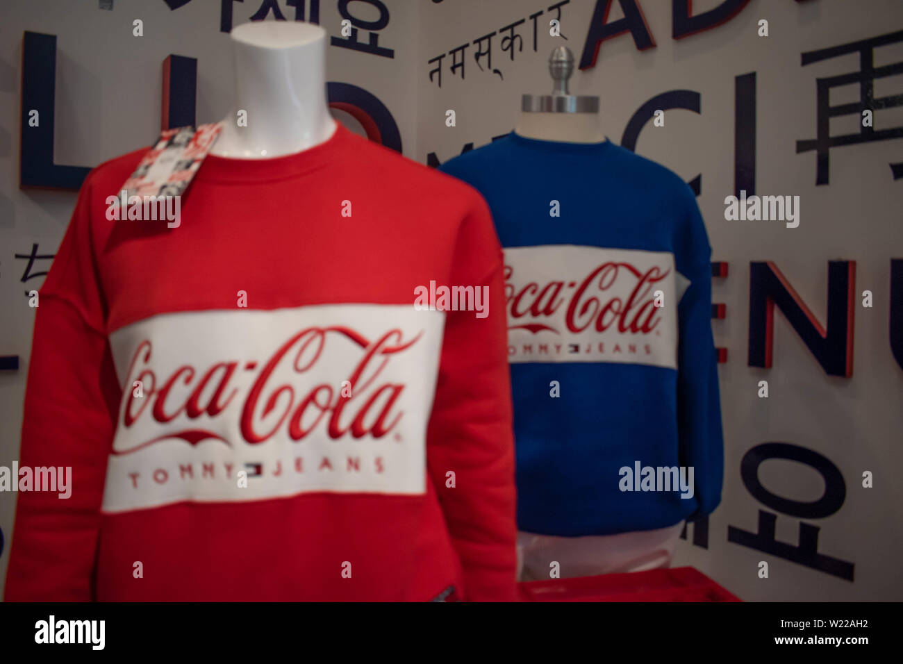Orlando, Florida. June 6, 2019 . Colorful Coca Cola clothes by Tommy  Hilfiger at Premium Outlet in International Drive area Stock Photo - Alamy
