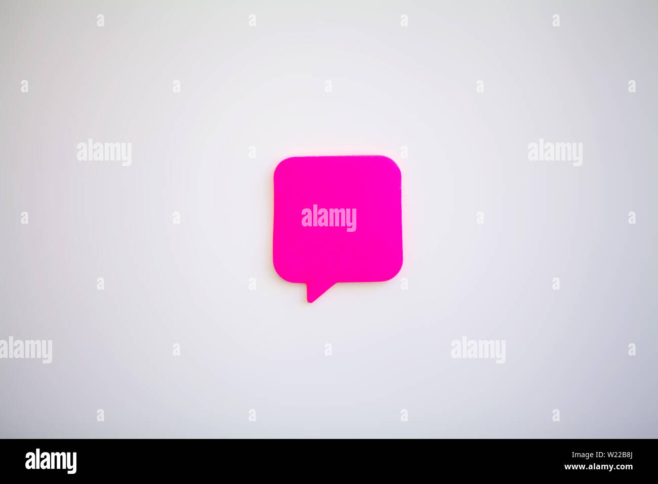 Stickers on white wall. Empty Space for text Stock Photo - Alamy