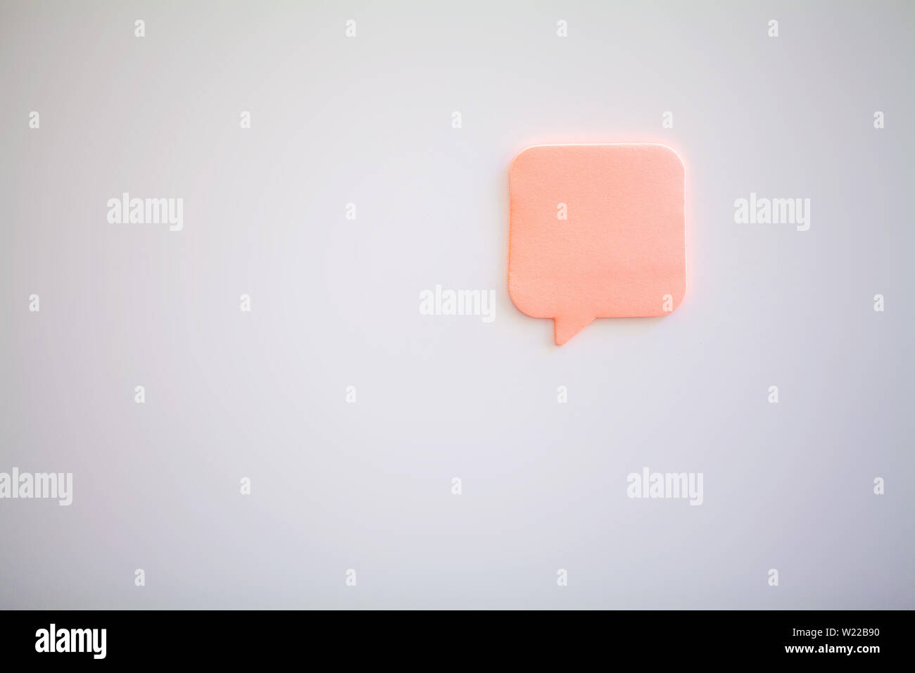 Stickers on white wall. Empty Space for text Stock Photo - Alamy
