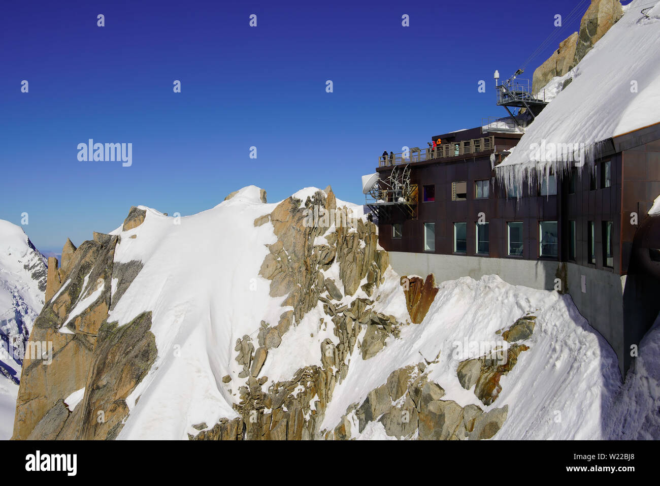 View of Aiguille Du Midi cable car station. Mont Blanc massif in the French Alps above Chamonix. Stock Photo