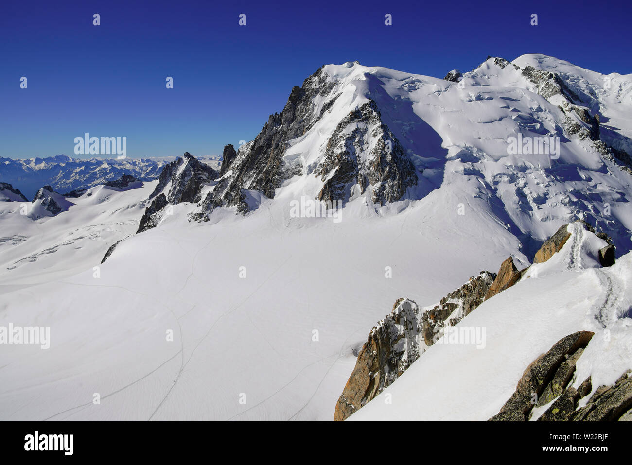 View of Mont Blanc massif in the French Alps above Chamonix. France, From Aiguille Du Midi cable car station. Stock Photo