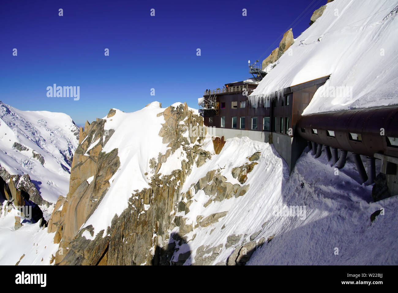 View of Aiguille Du Midi cable car station. Mont Blanc massif in the